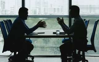 Two people netotiating a real estate purchase