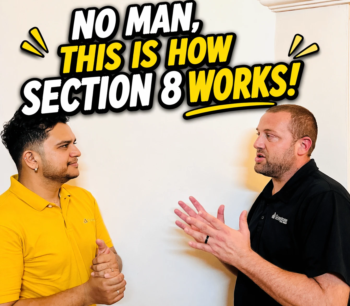 Two men discuss in front of a wall sign that reads 'NO MAN, THIS IS HOW SECTION 8 WORKS!'