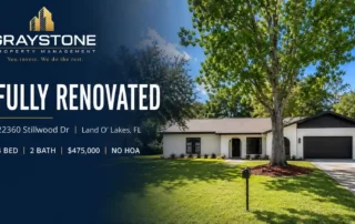 Graystone Property Management banner featuring a renovated single-family home with the text 'Fully Renovated' and address 22360 Stillwood Dr, Land O' Lakes, FL; 4 bed, 2 bath, $475,000, no HOA.